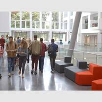 Students in a modern office building lobby, representative of Intern Gateway placements