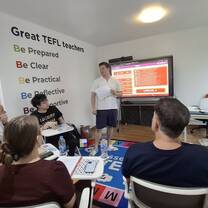 Trainer leading a lesson planning session at Essential TEFL Bangkok