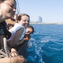 A photo from a class excursion where we took a boat ride on a pirate ship! (Barceloneta Beach in the background)