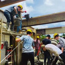 Service work building a hurricane-proof structure of a home