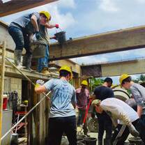 Service work building a hurricane-proof structure of a home