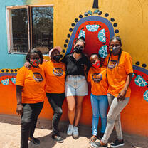 The crèche team and the crèche kids