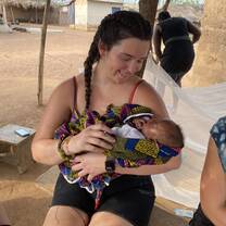 A premature twin whose mother died during childbirth. She and her sister are healthy and living with their aunt! 