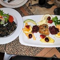 Raw Ostrich, Raw Springbok, Cooked crocodile tail and cooked Palm weevil larvae