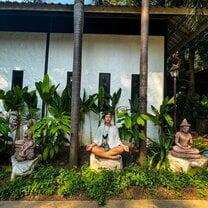 Meditating in the garden at our resort in Erawan National Park 