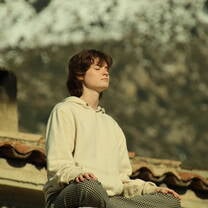 my friend meditating with views 