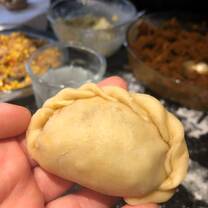 Making empanadas in a private cooking class