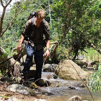 Trekking through a jungle river