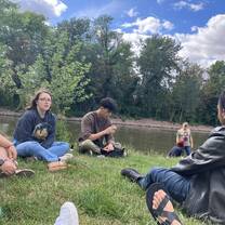 With coworkers and other volunteers in the park