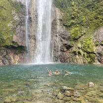 Swimming in a waterfall