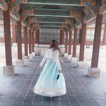 Wearing a hanbok (traditional style clothing) at a Korean Palace