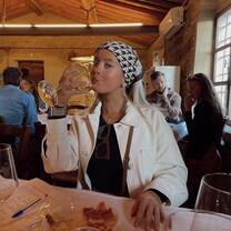 Me taste-testing wine in the vineyards of Tuscany