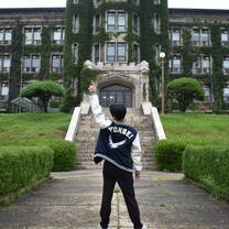 Representing Yonsei Univeristy in front of one of its ivy-covered buildings. 