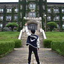 Representing Yonsei Univeristy in front of one of its ivy-covered buildings. 