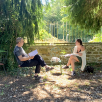 A teacher and student rehearsing lines for a short film scene. 