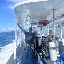 Happy dive guides on the boat 