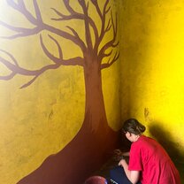 painting a big tree in the school