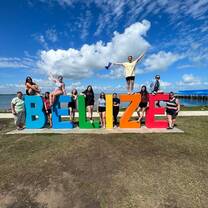 Illinois state university at the Belize sign!