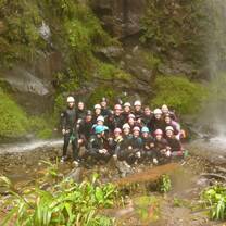 Repelling down waterfalls in Banos!