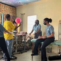 Student Group working with patient at OW