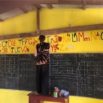 Painting the alphabet in a Kindergarten classroom 