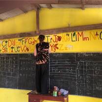 Painting the alphabet in a Kindergarten classroom 
