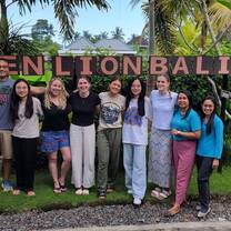 Photo with local staffs and fellow volunteers 