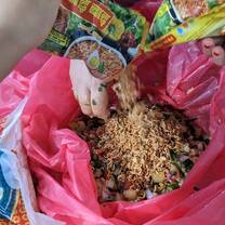Preparing local food with the staff: Chatpate