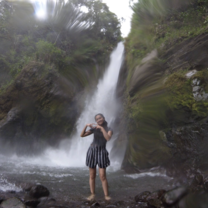 Me in front of a beautiful waterfall we visited!