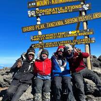 Uhuru peak with my green paw guides 