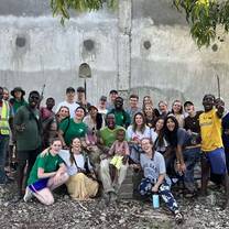 Our whole group on our last day, in front of the wall we had finished during our weeks of construction!