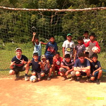 "Soccer after school with the local youth". (I'm On the left and my Partner, Reuben, Is on the right... were both white)