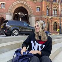 Enjoying a beautiful day after work outside of King's Cross Station 