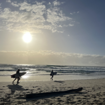 Surfers at Duranbah Beach