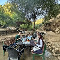 Picnicking with friends at a wadi in the north