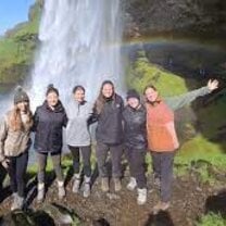 Standing under a waterfall