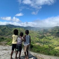 Fijian children from the village looking out over the heart of Fiji
