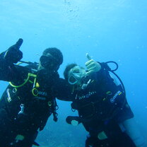 Life underwater with dive master Junior