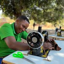 Sewing machine training for the women of the mother group with trainer Tekla