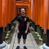 Under Fushimi Inari torii gates in Kyoto. An hour away from my placement.