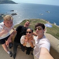 Group at the top of La Torre de Hercules, the oldest known extant lighthouse