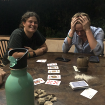 game of rock cards with housemates, staying in Diani- a weekend away from the village