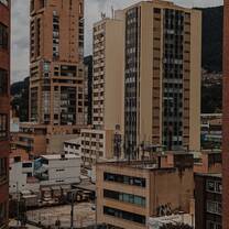 View of the YMCA office and the mountains behind from a nearby apartment