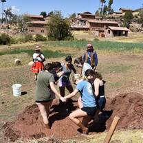 Making adobe for a local community in Misminay, Peru