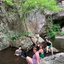Group of my closest friends and I at a waterfall near Chiang Mai