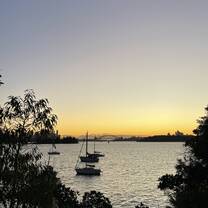 Views of the Harbour Bridge at Sunset from North Bondi Beach 