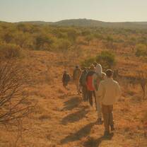 Walking through the South African bush in Nambiti Big Five Game Reserve.