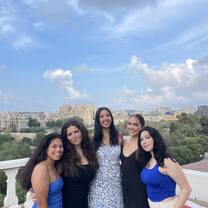 My friends and I enjoying happy hour on a rooftop terrace overlooking the city of Valencia