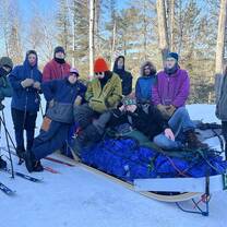 Group photo on the dogsled we built from scratch!