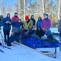 Group photo on the dogsled we built from scratch!